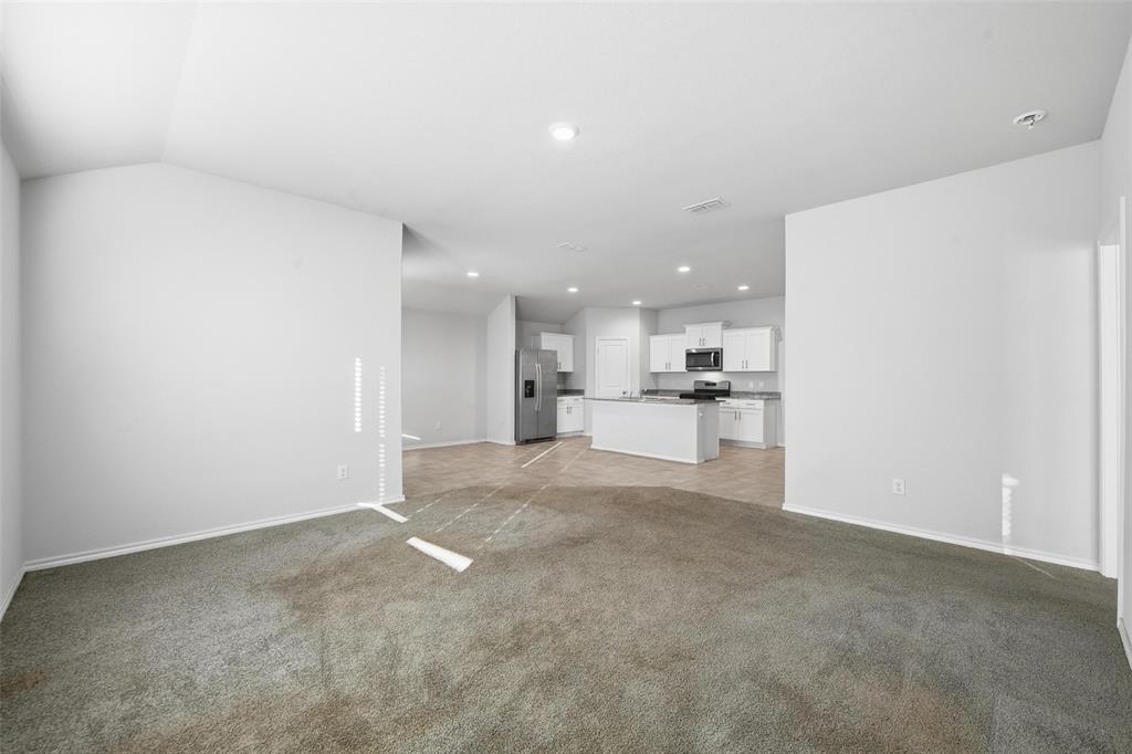 549 Bronze Circle East Springtown, TX 76082 - Photo 7 of 29 a view of a kitchen with a sink and cabinets