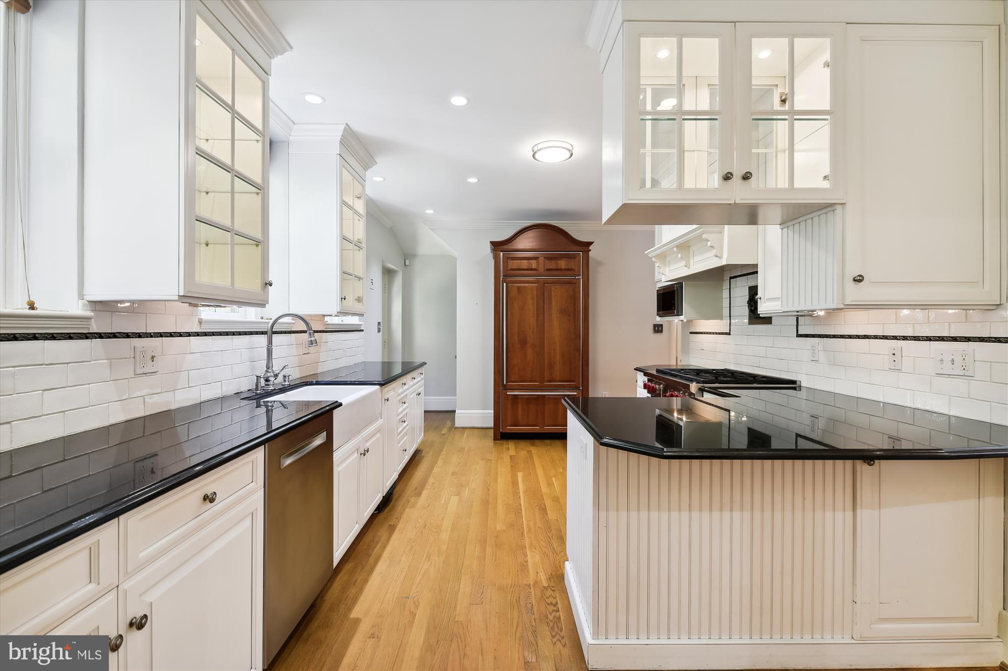 117 Upnor Road Baltimore, MD 21212 - Photo 11 of 32 a large kitchen with stainless steel appliances granite countertop a sink and a stove