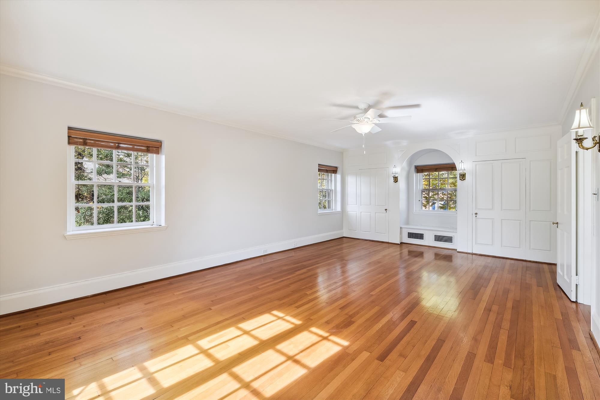 117 Upnor Road Baltimore, MD 21212 - Photo 15 of 32 wooden floor in an empty room with a window