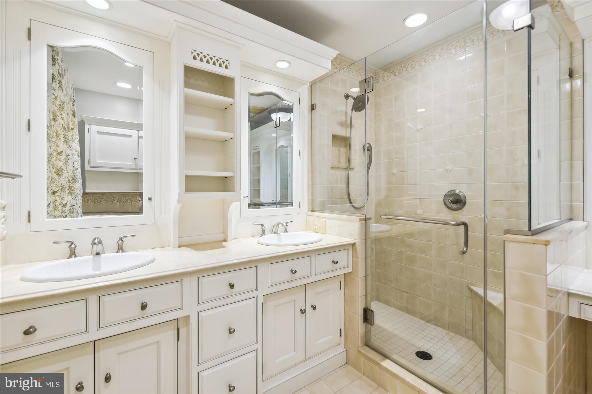 117 Upnor Road Baltimore, MD 21212 - Photo 16 of 32 a bathroom with a shower sink vanity granite and shower
