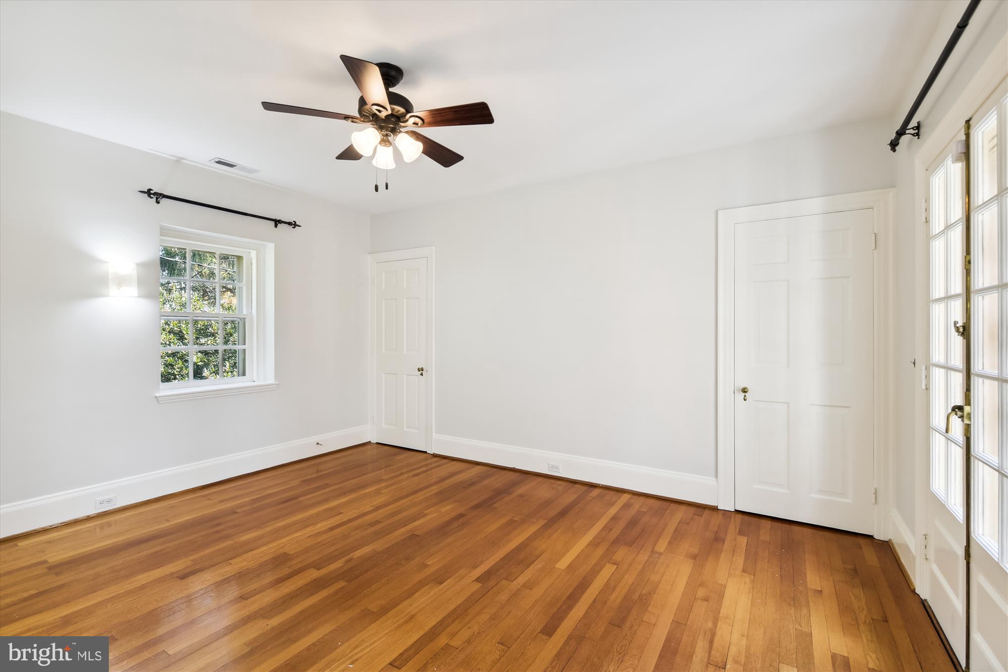 117 Upnor Road Baltimore, MD 21212 - Photo 20 of 32 wooden floor in an empty room with a window
