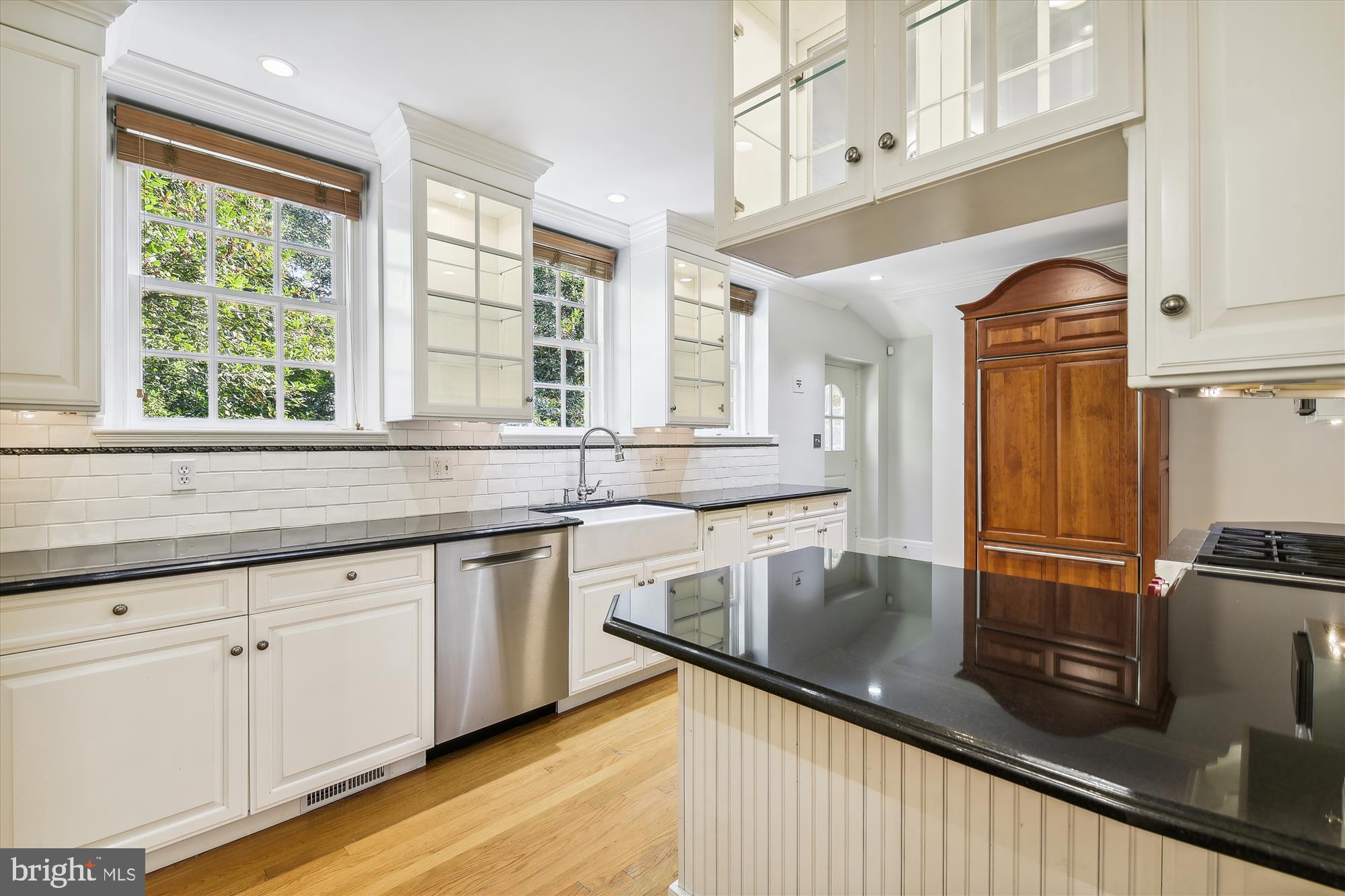 117 Upnor Road Baltimore, MD 21212 - Photo 10 of 32 a kitchen with stainless steel appliances granite countertop a sink and a white wooden cabinets
