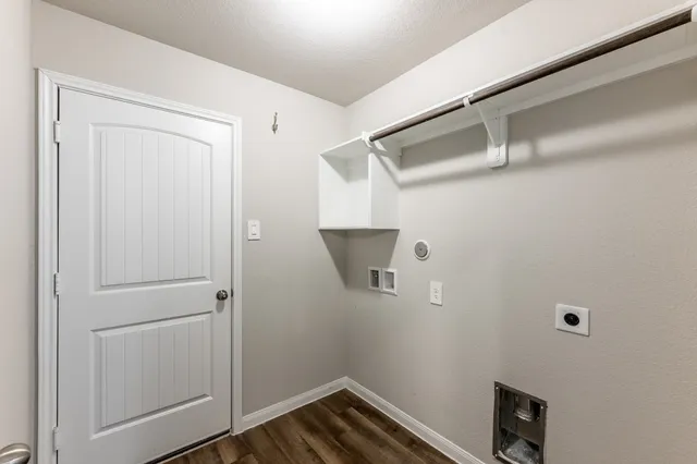 a bathroom with a shower and a sink