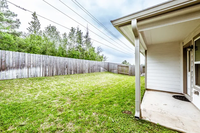 a view of a backyard with a garden