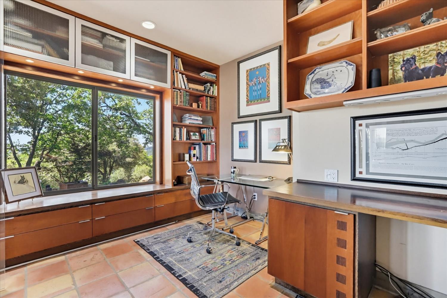 20111 Tanglewood Road Grass Valley, CA 95945 - Photo 28 of 93 a hallway with a large window and cabinets