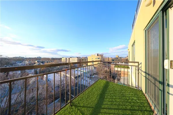 a view of a balcony with lake view