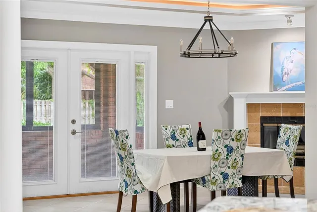 a bathroom with a white bath tub and a shower