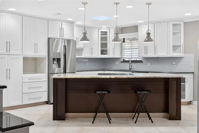 a view of a park with large trees