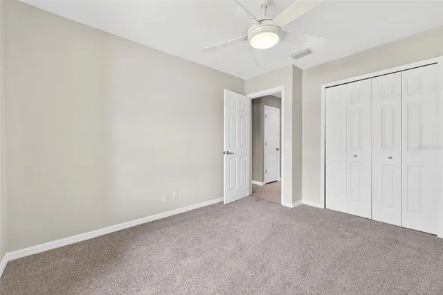 an aerial view of multiple houses with yard