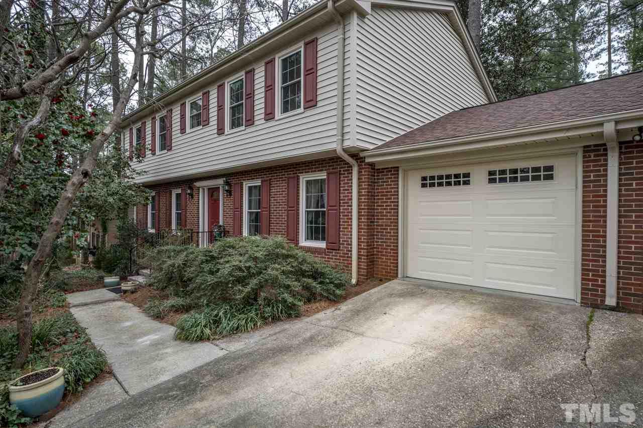 4616 Fernham Place Raleigh, NC 27612 - Photo 26 of 26 a front view of a house with a garage