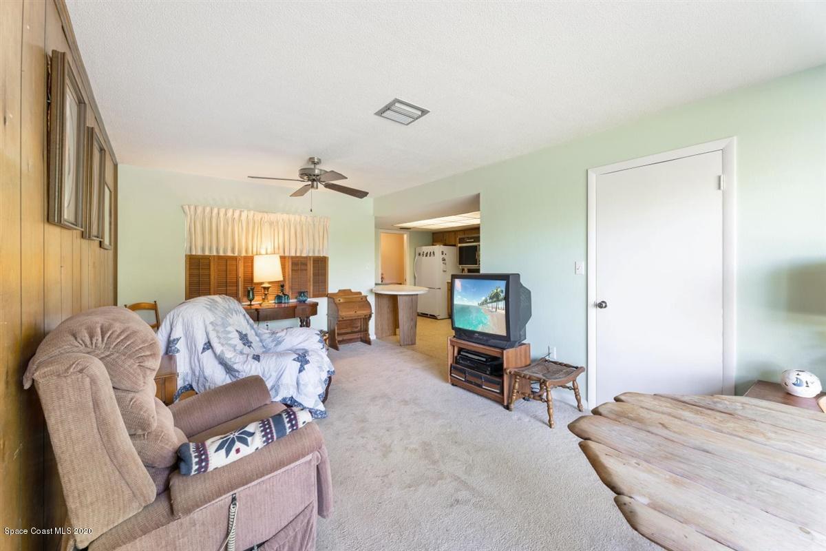 124 La Riviere Road Cocoa Beach, FL 32931 - Photo 6 of 19 Family Room2