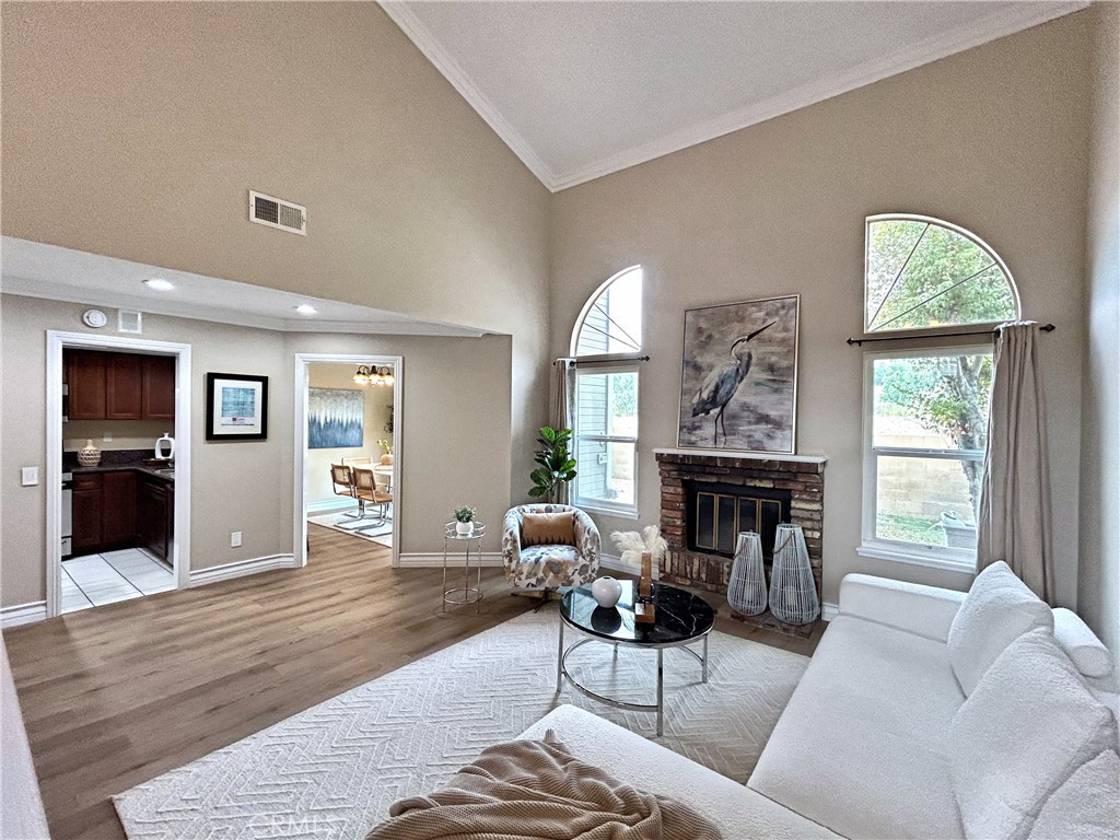 555 Canyon Hill Road San Dimas, CA 91773 - Photo 12 of 16 a living room with furniture and a fireplace