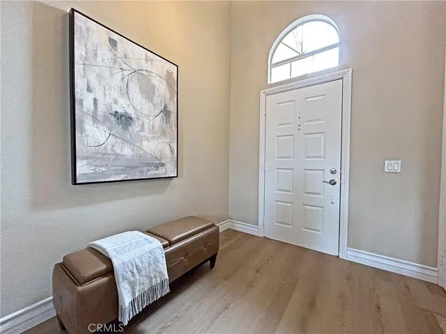 a room with furniture and a window