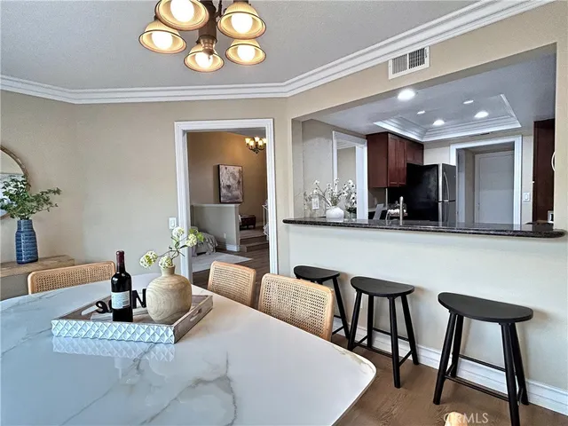 a view of a dining room with furniture