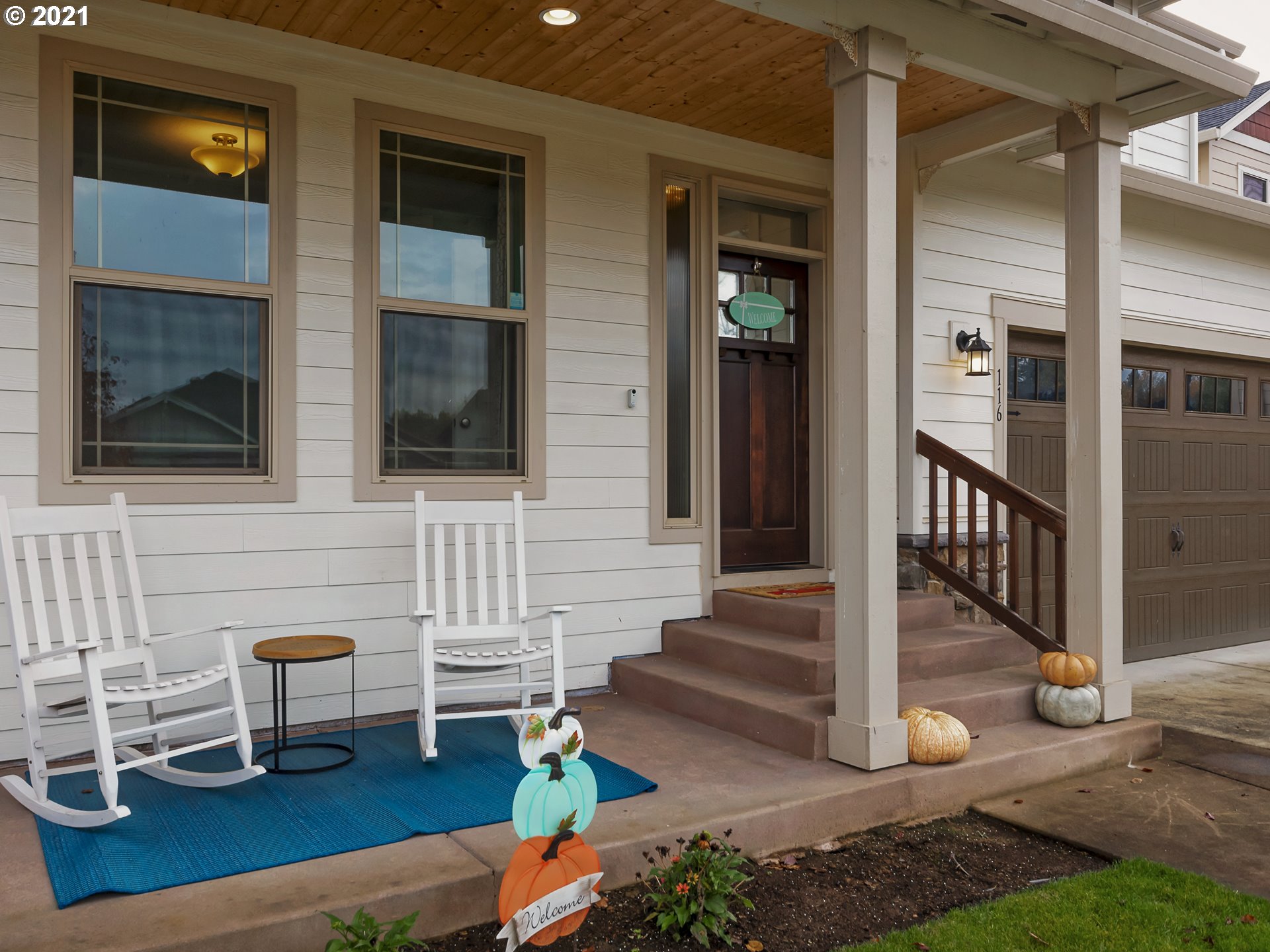 116 North 38th Place Ridgefield, WA 98642 - Photo 3 of 31 a view of front door of house with outdoor seating