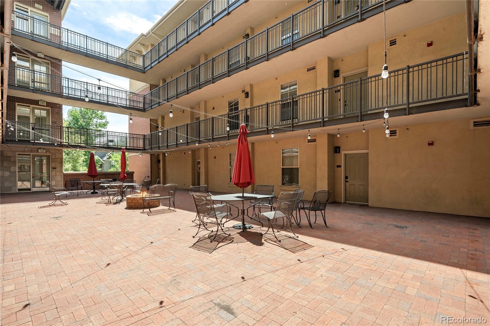 1699 North Downing Street, Unit 306 Denver, CO 80218 - Photo 26 of 26 a view of a building with sitting area