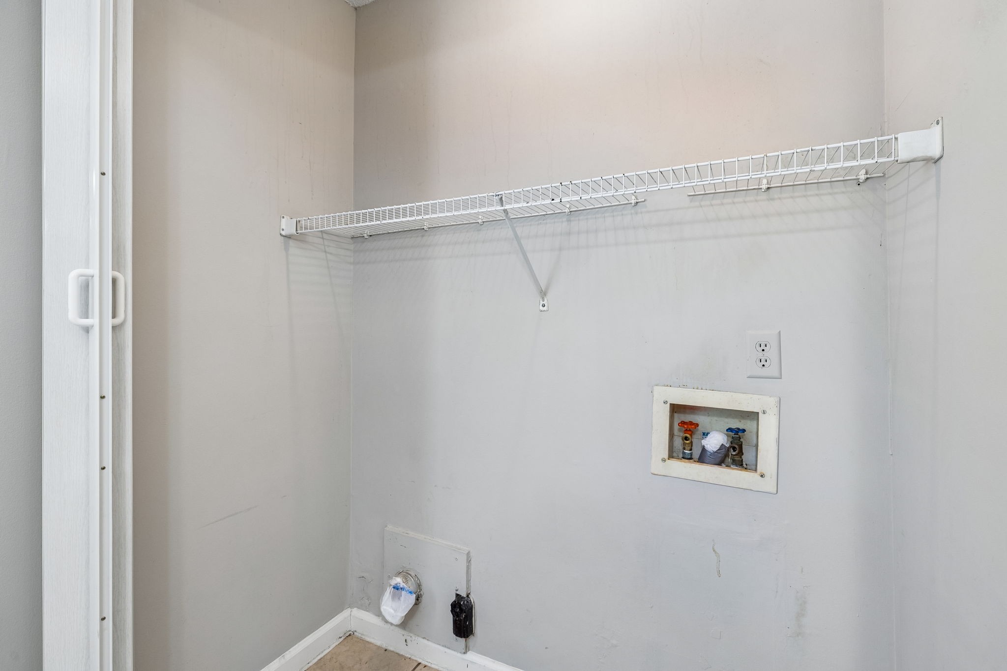 809 Fawn Lane Madison, TN 37115 - Photo 18 of 43 a view of a room with racks on the wall