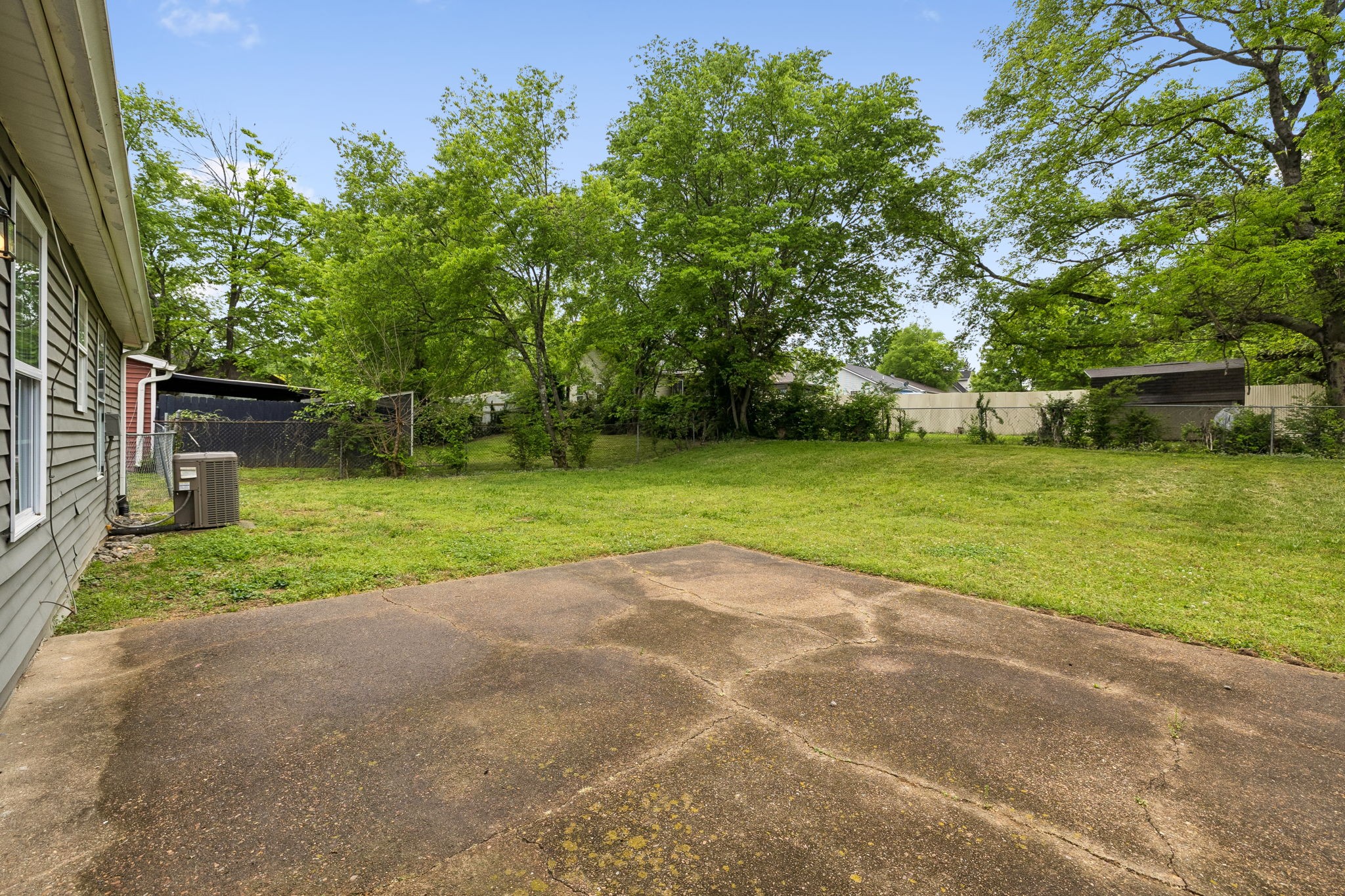 809 Fawn Lane Madison, TN 37115 - Photo 32 of 43 a view of a backyard with large trees