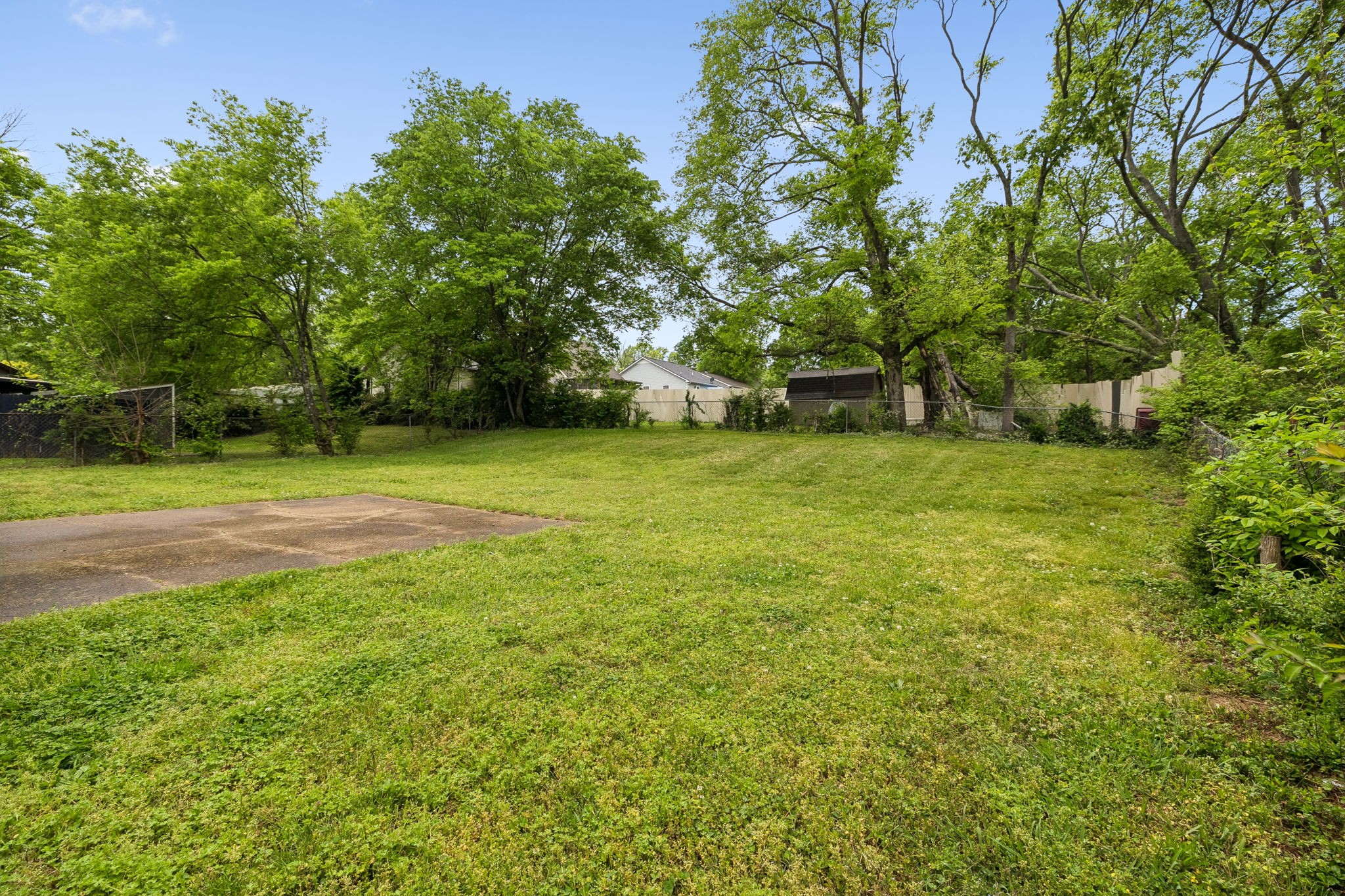 809 Fawn Lane Madison, TN 37115 - Photo 34 of 43 a view of a field with trees in the background