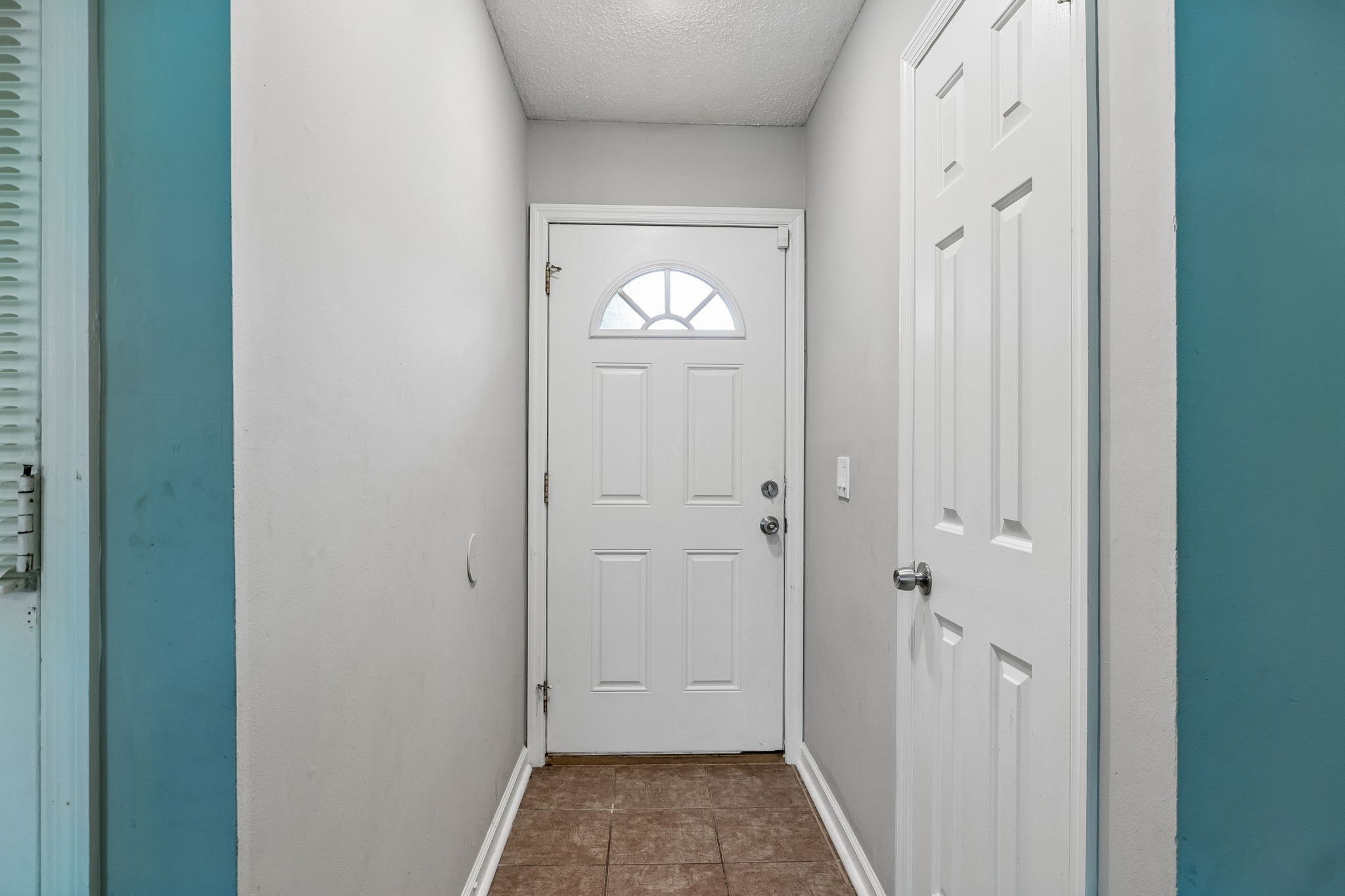 809 Fawn Lane Madison, TN 37115 - Photo 4 of 43 a view of a hallway with front door