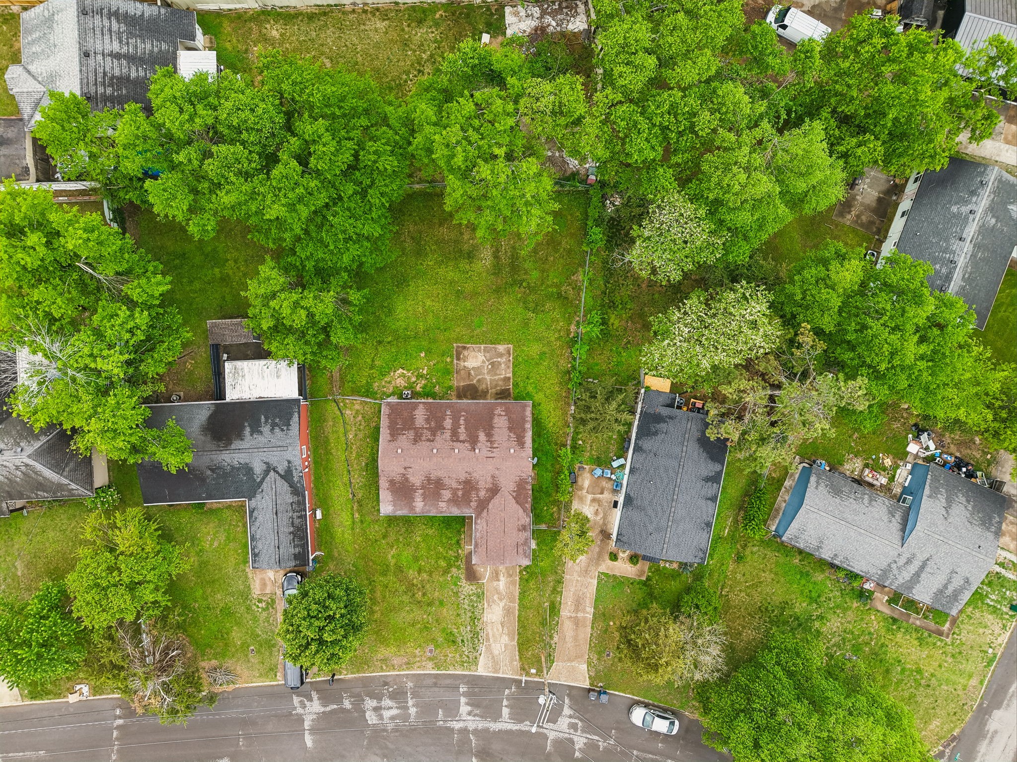 809 Fawn Lane Madison, TN 37115 - Photo 43 of 43 an aerial view of a house with outdoor space and trees all around
