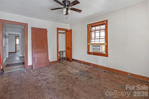 an empty room that has a window