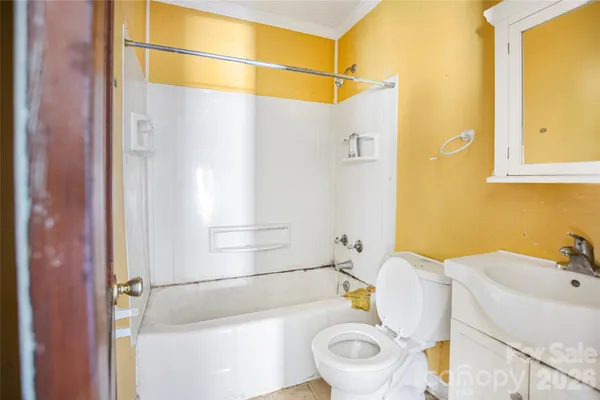 a bathroom with a sink and toilet