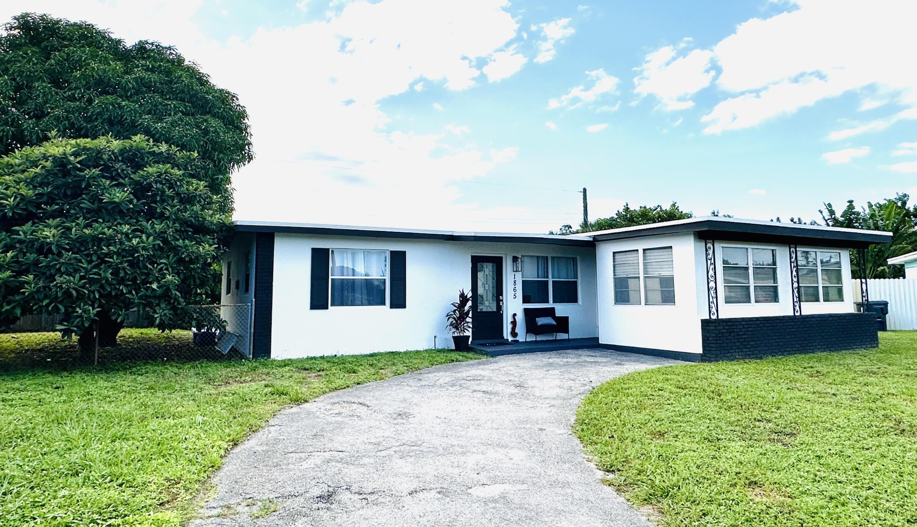 1865 West Chatham Road West Palm Beach, FL 33415 - Photo 1 of 56 1