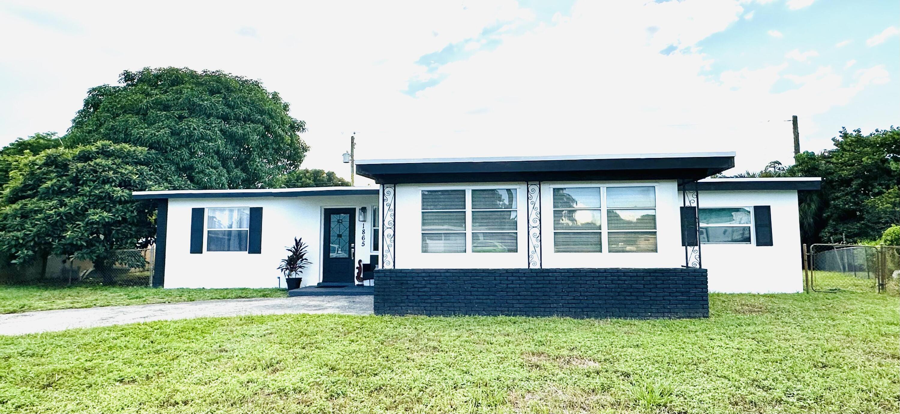 1865 West Chatham Road West Palm Beach, FL 33415 - Photo 2 of 56 2