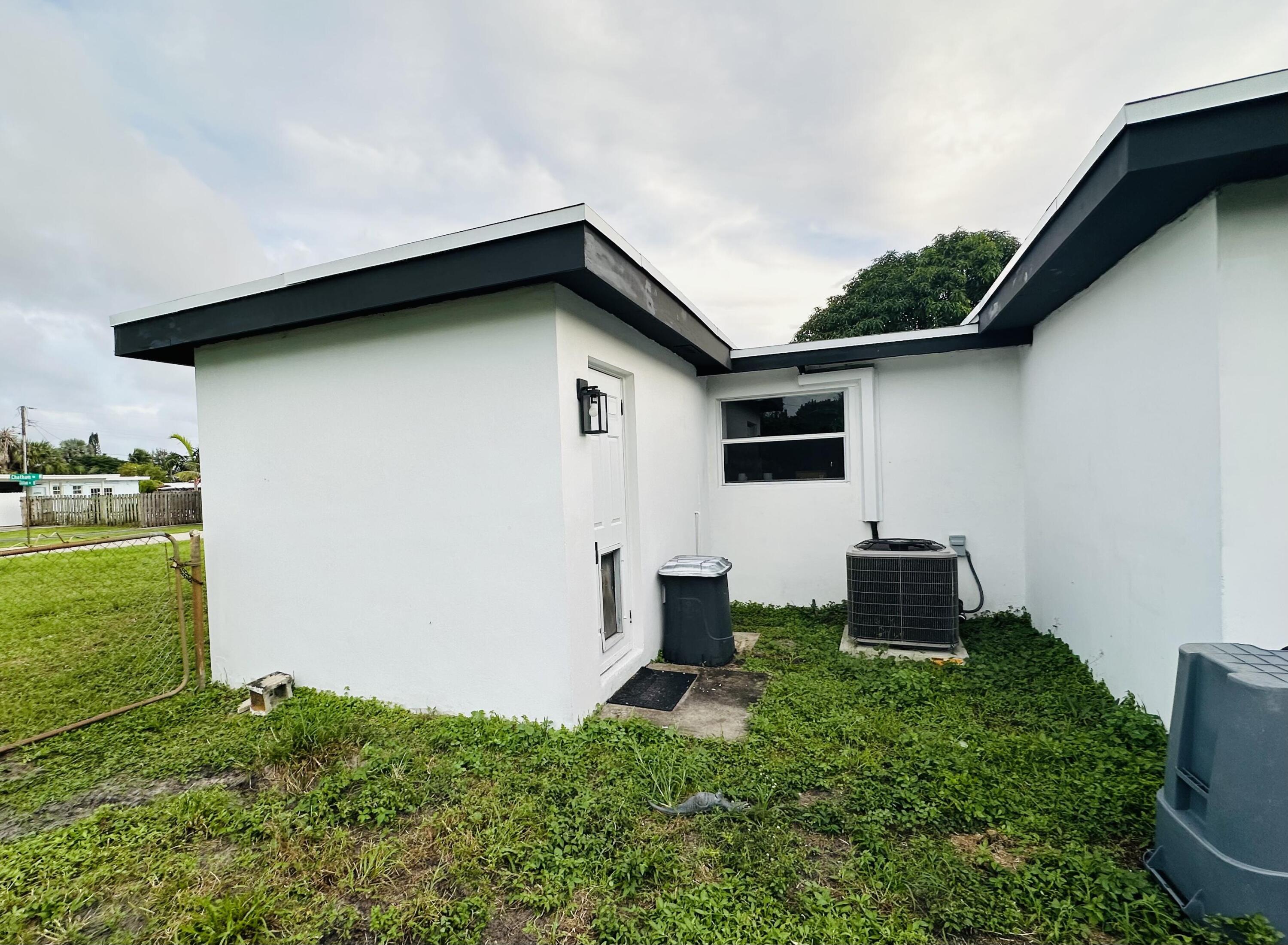 1865 West Chatham Road West Palm Beach, FL 33415 - Photo 5 of 56 6