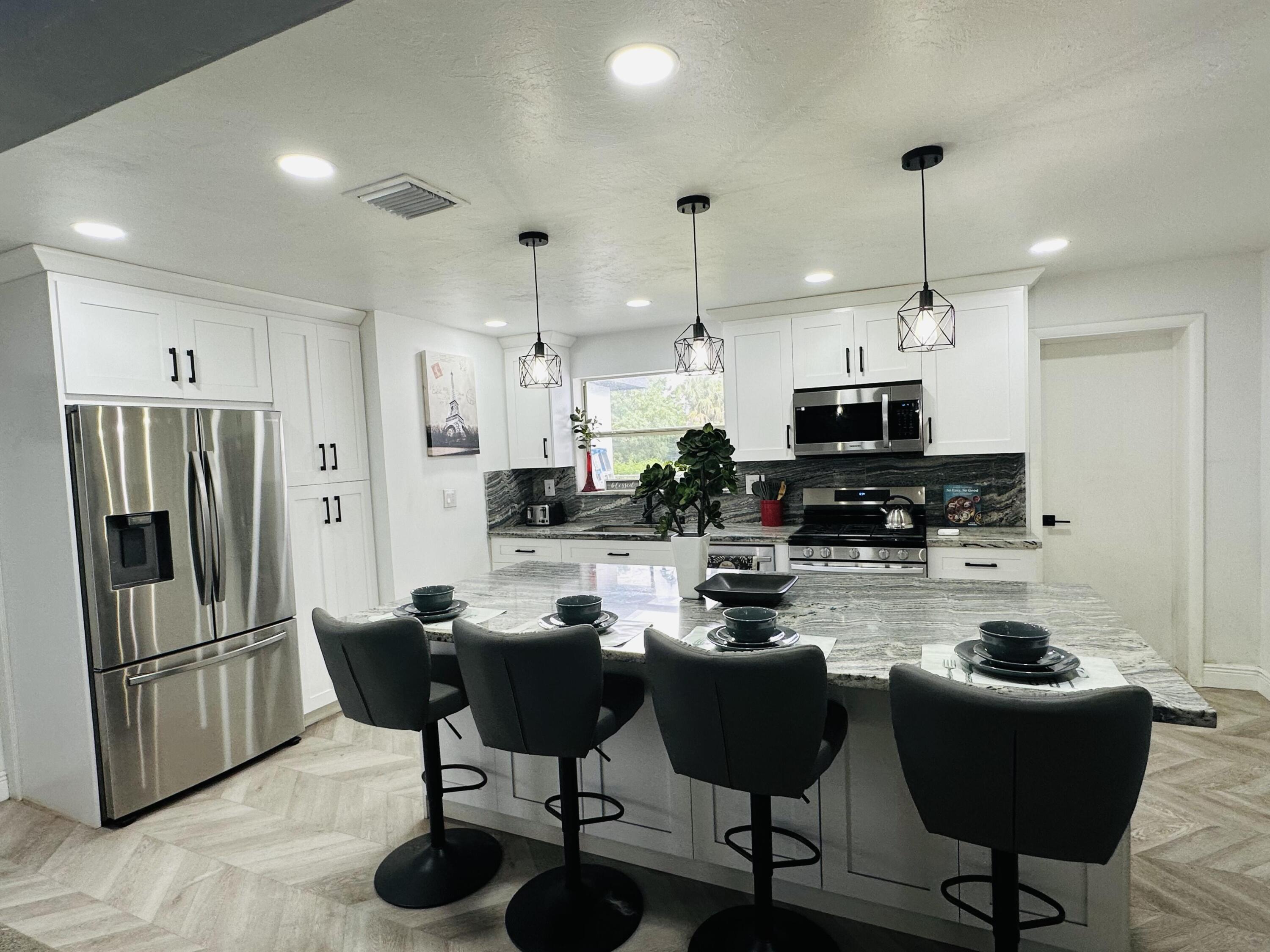 1865 West Chatham Road West Palm Beach, FL 33415 - Photo 7 of 56 8