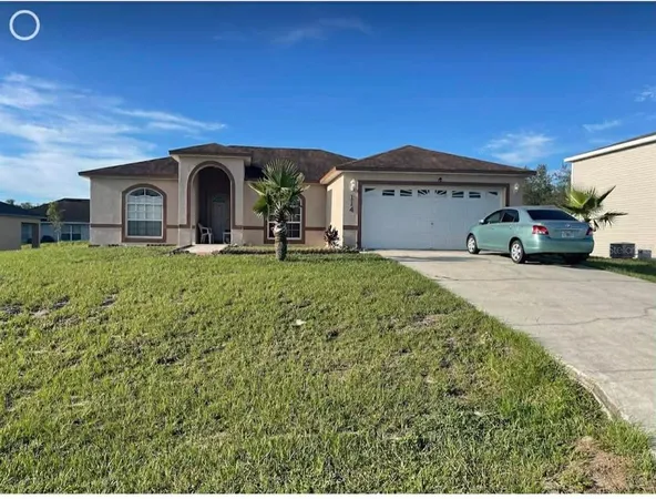 a house view with a garden space