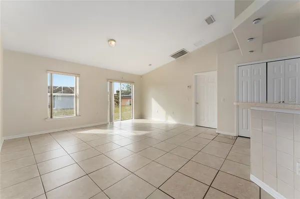 a view of an empty room and window