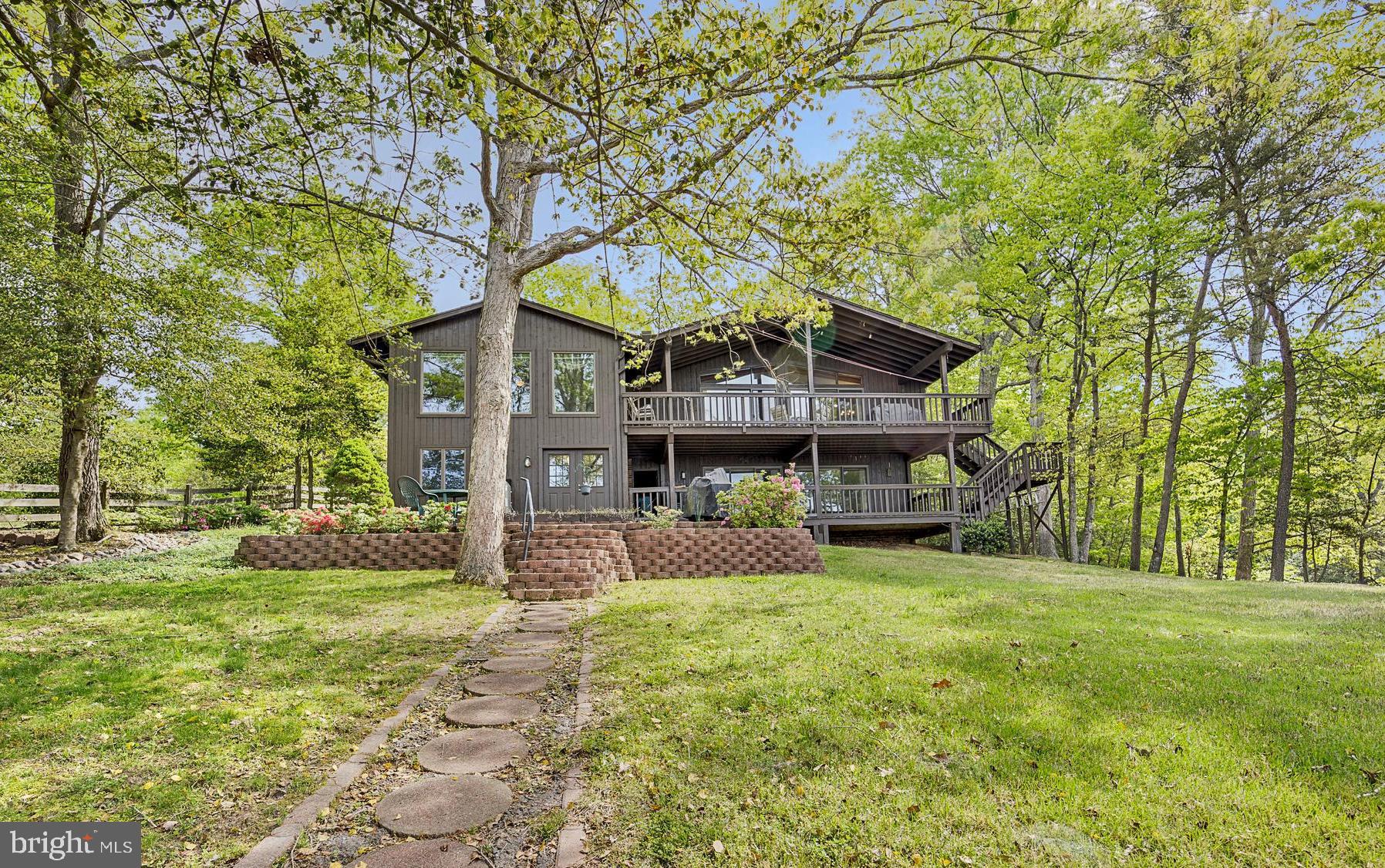 1405 Crabhouse Road Lusby, MD 20657 - Photo 2 of 47 View of home from the pier