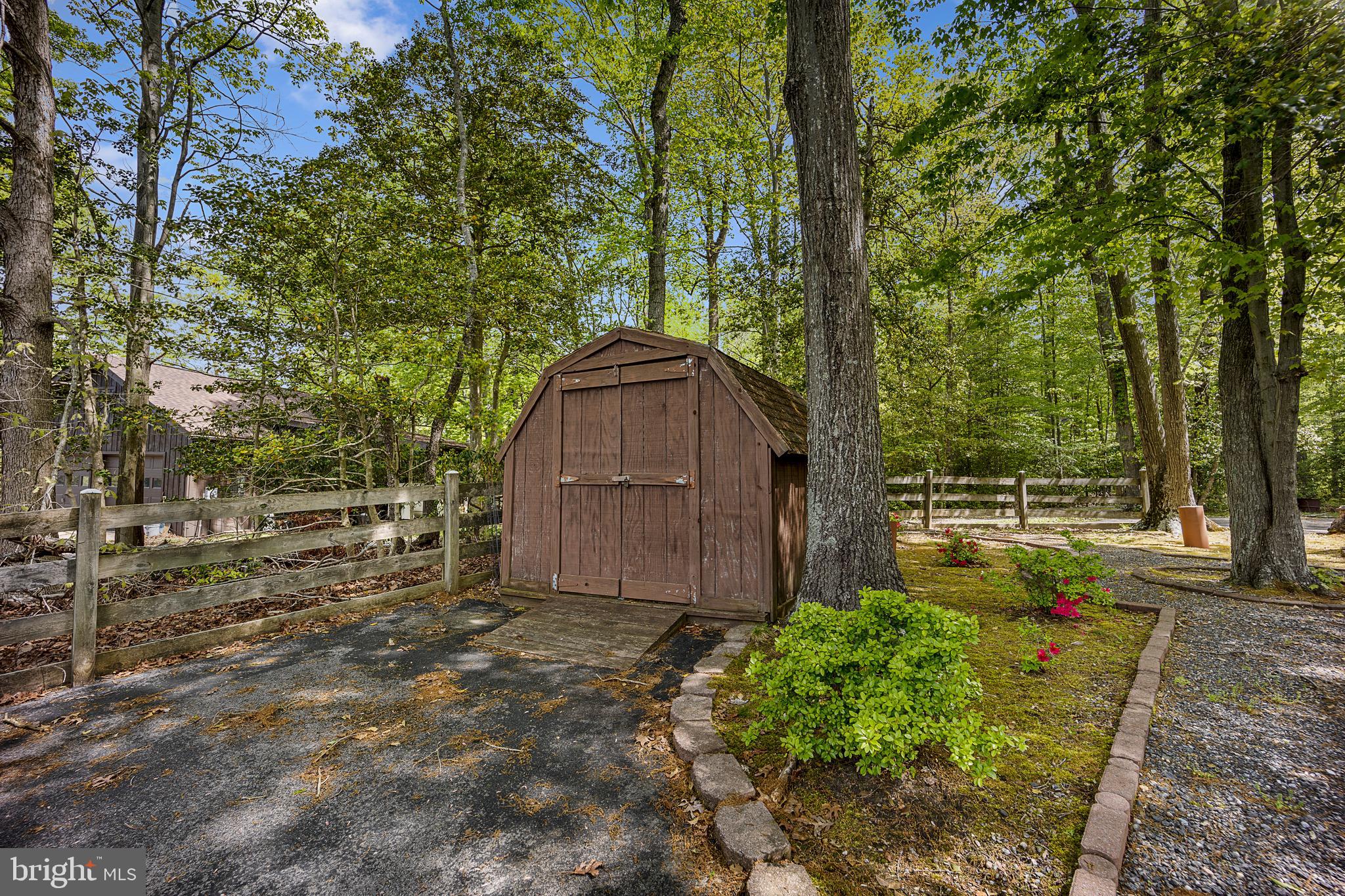 1405 Crabhouse Road Lusby, MD 20657 - Photo 14 of 47 Shed for small yard equipment storage.