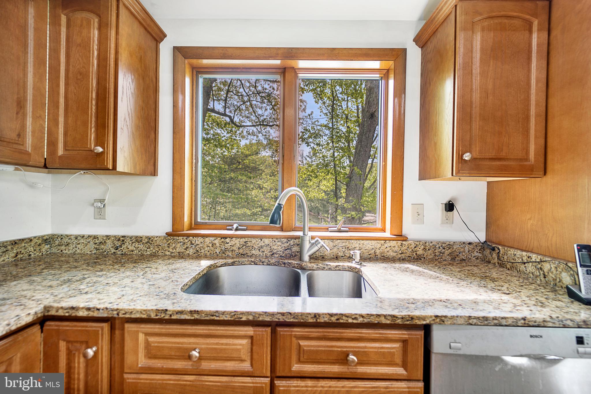 1405 Crabhouse Road Lusby, MD 20657 - Photo 20 of 47 Kitchen sink with creek views!