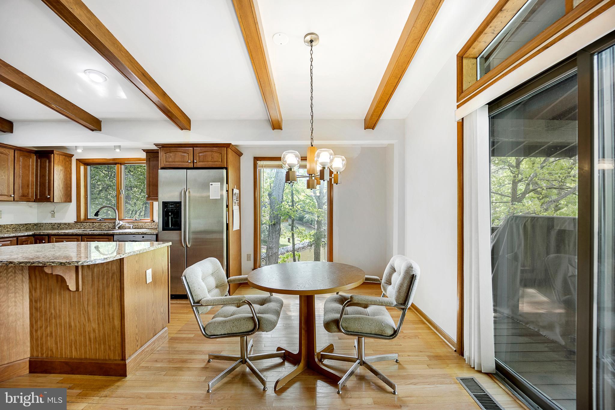 1405 Crabhouse Road Lusby, MD 20657 - Photo 23 of 47 Breakfast area with views everywhere!