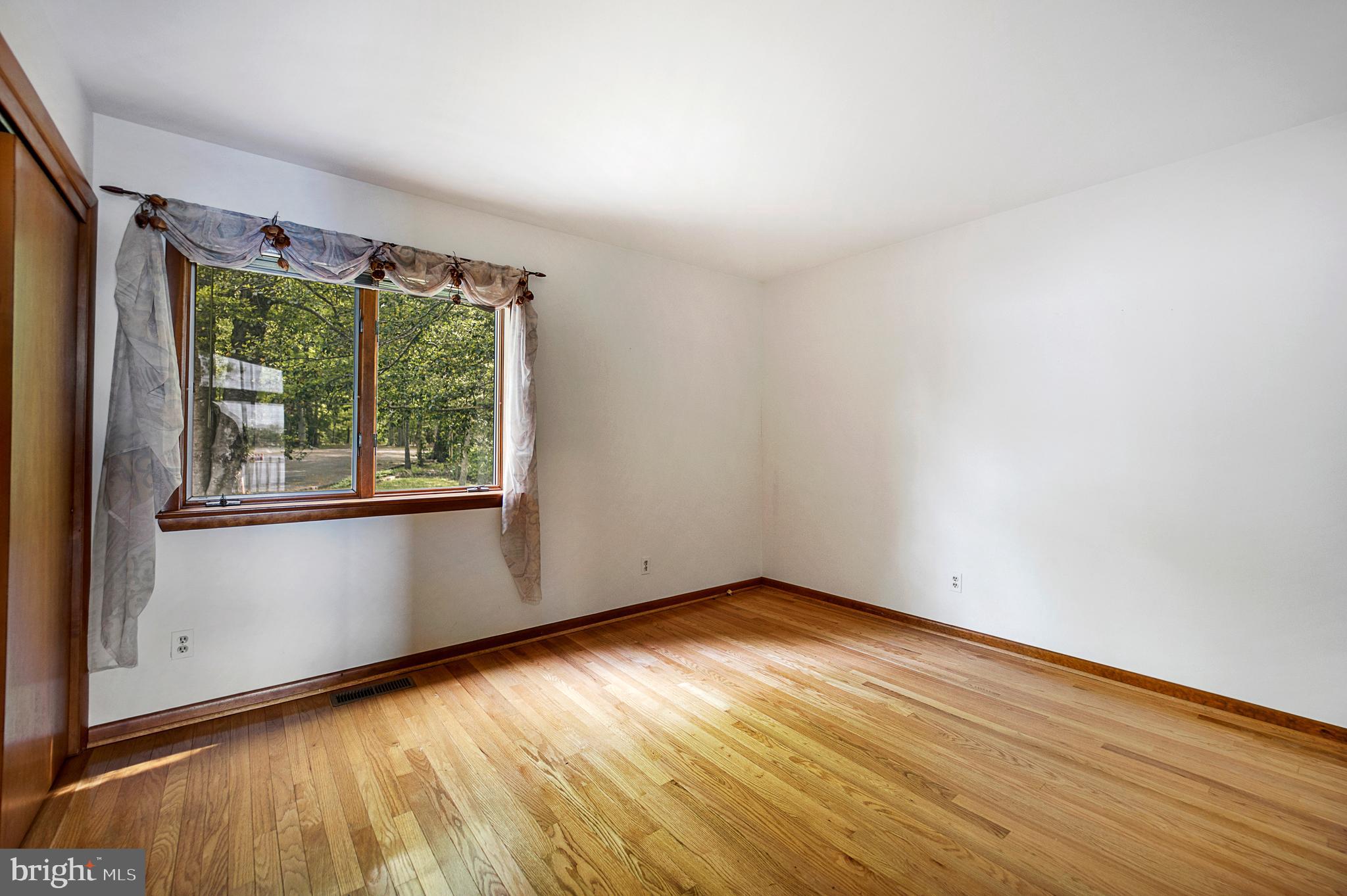 1405 Crabhouse Road Lusby, MD 20657 - Photo 29 of 47 Bedroom 2 with hardwood floors