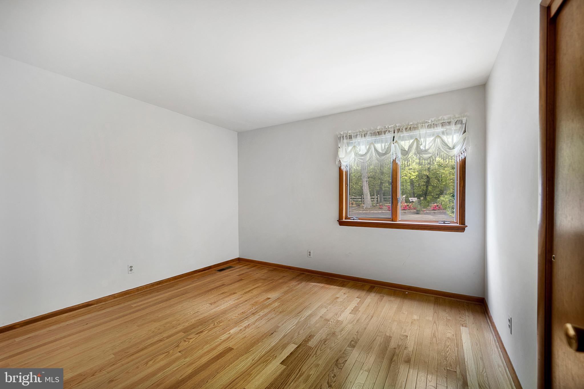 1405 Crabhouse Road Lusby, MD 20657 - Photo 30 of 47 Bedroom 3 with hardwood floors