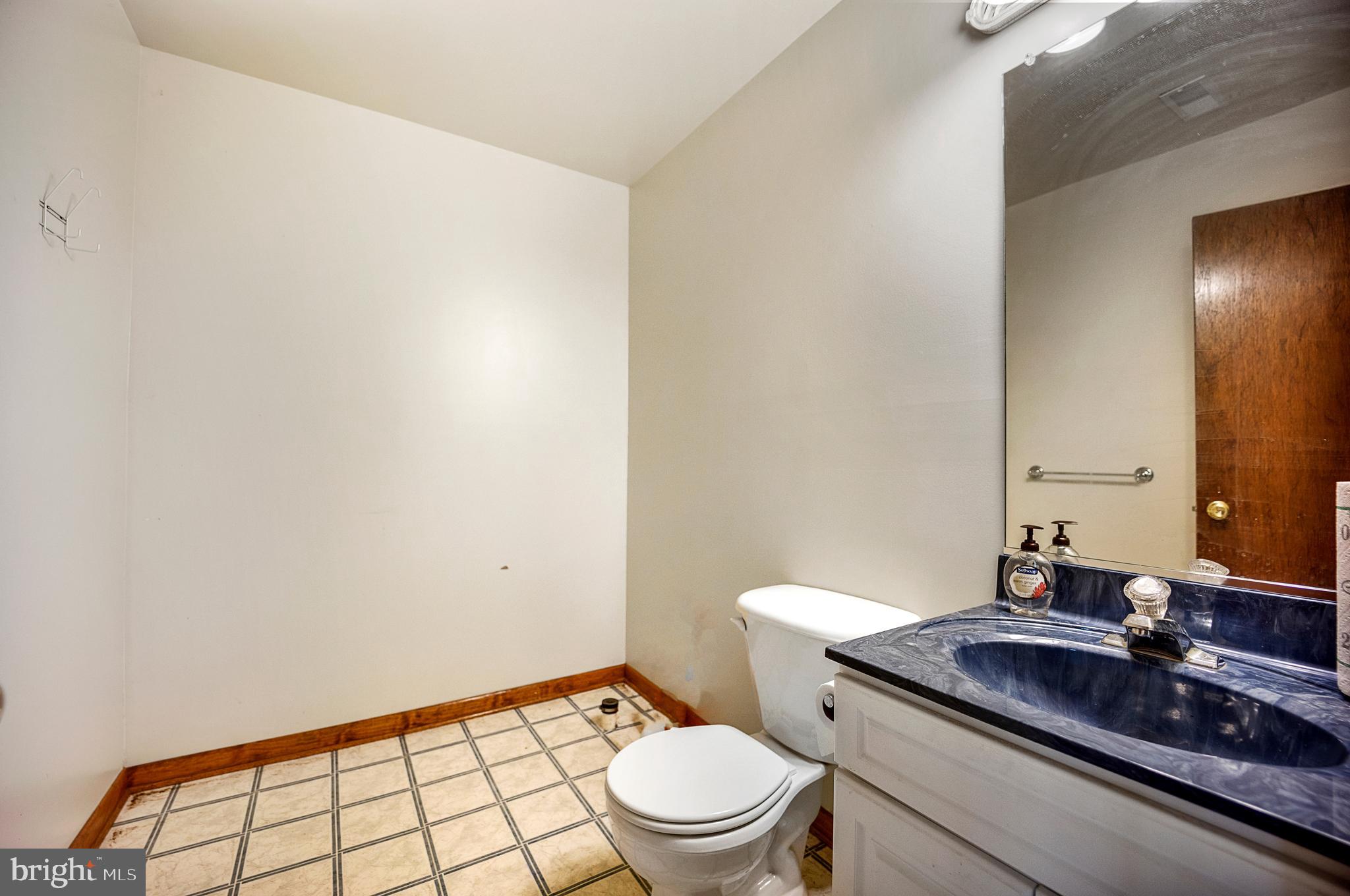 1405 Crabhouse Road Lusby, MD 20657 - Photo 34 of 47 Half bath in basement, roughed in for full bath!