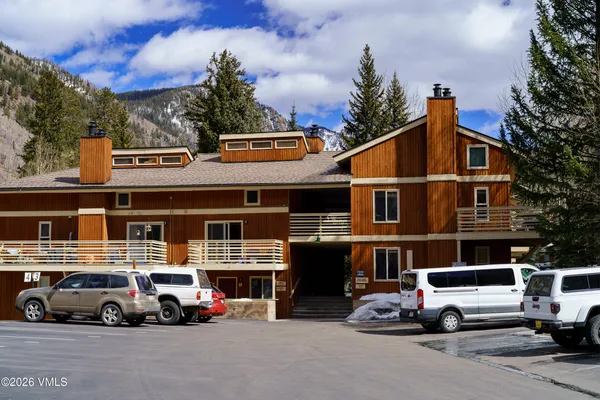 a car parked in front of a building