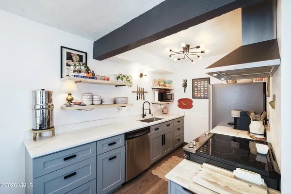 a spacious bathroom with a double vanity sink and a mirror