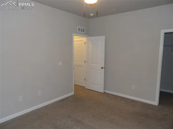 an empty room with an entryway