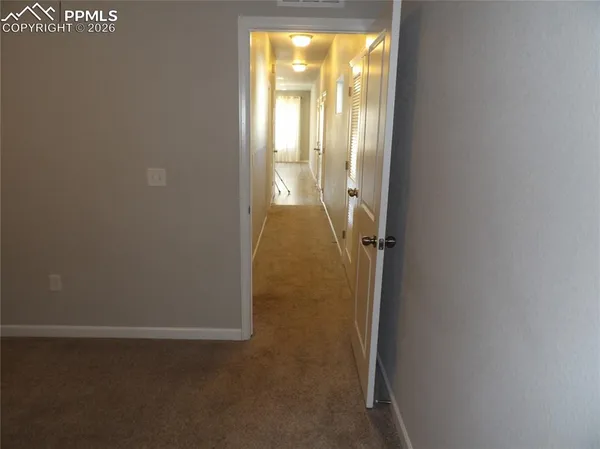 a bathroom with a glass door