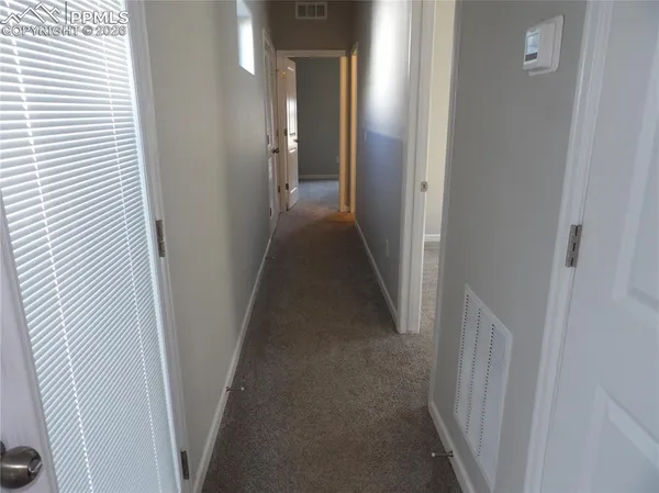 a view of a hallway with a hallway
