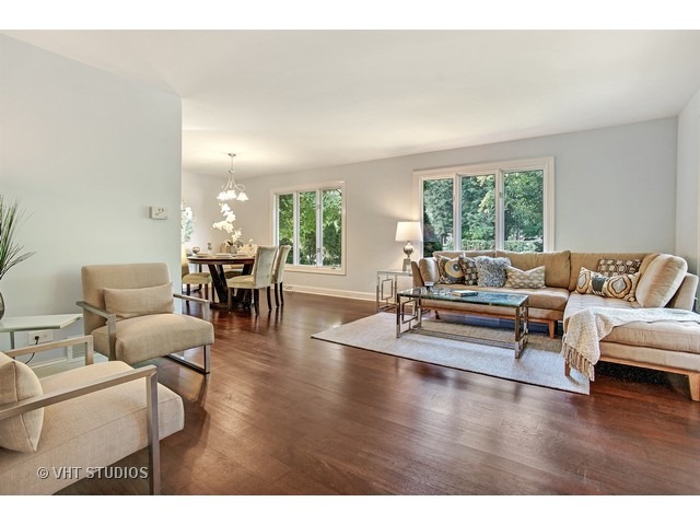 3720 Wilke Road Rolling Meadows, IL 60008 - Photo 2 of 25 a living room with furniture and a wooden floor