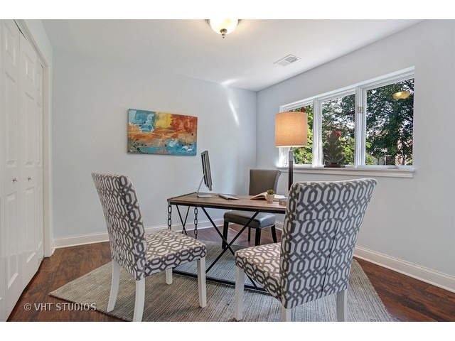3720 Wilke Road Rolling Meadows, IL 60008 - Photo 19 of 25 a view of a dining room with furniture window and outside view