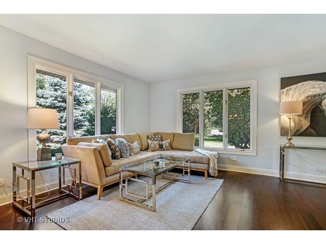 3720 Wilke Road Rolling Meadows, IL 60008 - Photo 8 of 25 a living room with furniture and a window