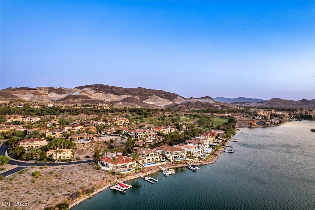 5 Rue Grimaldi Way Henderson, NV 89011 - Photo 20 of 45 Aerial view of a lake, mountains, and near by resi
