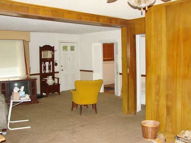 227 Clayton Road Durham, NC 27703 - Photo 4 of 6 Looking from Dining Room into Living Room, toward front door and Bedroom 2.